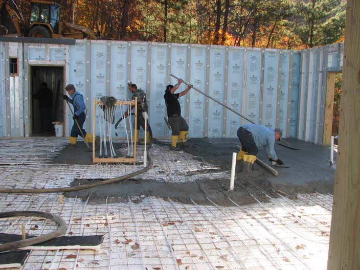 Pouring concrete on The Barrier insulation